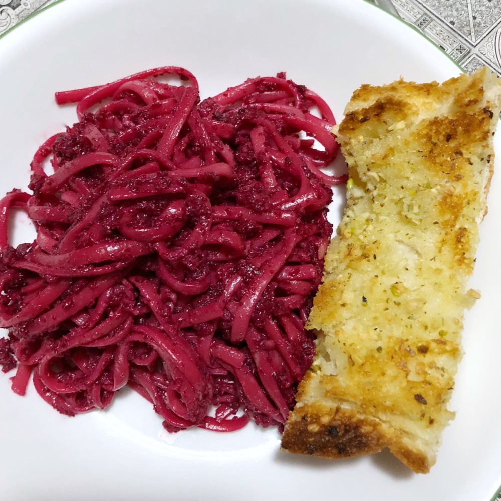 beet pesto linguini and garlic bread